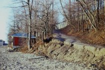 Erosion at base of old beach road